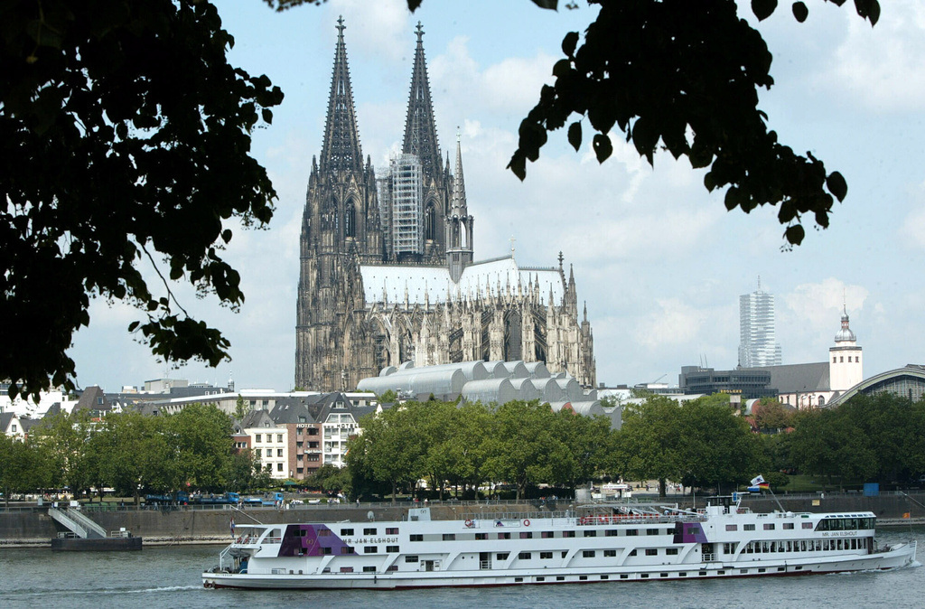 FILE - The Cologne Cathedral is seen in Cologne, Germany, July 6, 2004. (AP Photo/Hermann J. Knippertz, File)