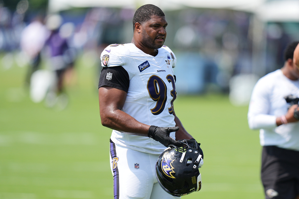 Baltimore Ravens defensive end Calais Campbell (93) watches during the team's NFL football training camp, Tuesday, Aug. 11, 2026, at the Under Armour Performance Center in Owings Mills, Md. (AP Photo/Stephanie Scarbrough)