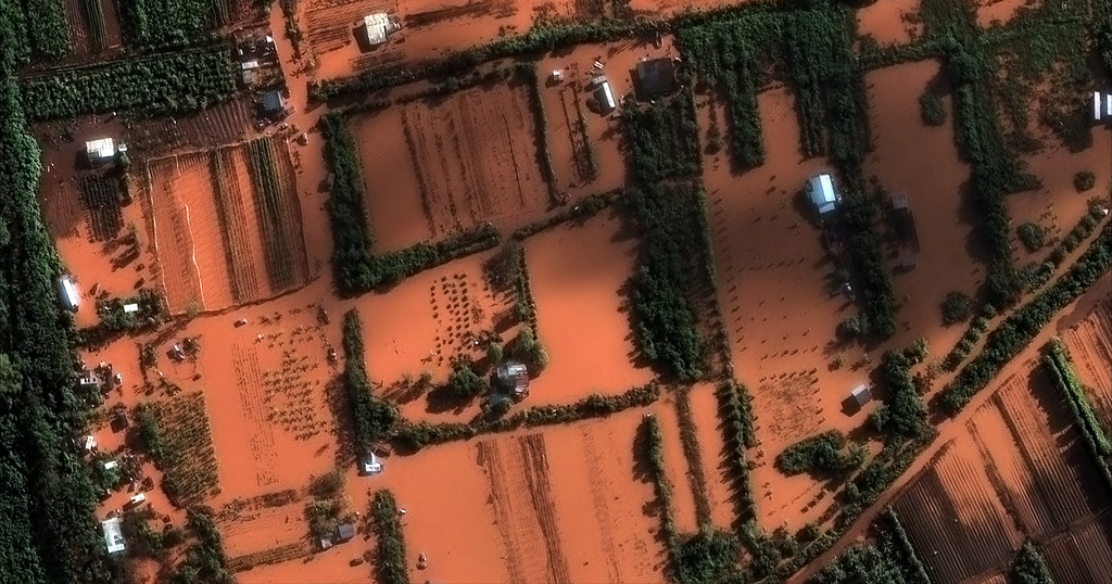 In this satellite image provided by Vantor is a closer view of flooded fields and buildings, Monday, March 23, 2026, in neighborhoods near Waialua, Hawaii. (Satellite image ©2026 Vantor via AP)