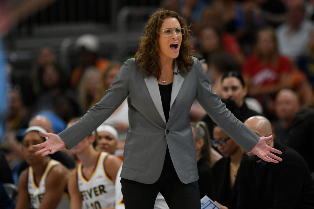 Indiana Fever head coach Stephanie White yells at referees after Caitlin Clark was called for a foul during the second half of a WNBA basketball game against the Chicago Sky in Chicago, Saturday, Aug. 8, 2026. (AP Photo/Paul Beaty)