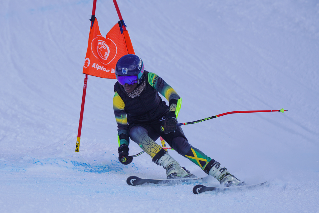 Skier Henniyah Rivers rounds a gate during a slalom training run, Wednesday, Dec, 10, 2025, at Loveland Ski Area in Dillon, Colo. (AP Photo/Brittany Peterson)