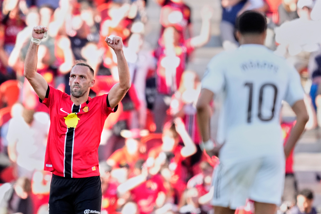 Mallorca's Vedat Muriqi celebrates after a goal during a La Liga soccer match between Mallorca and Real Madrid in Palma de Mallorca, Spain, Saturday, April 4, 2026. (AP Photo/Jose Breton)