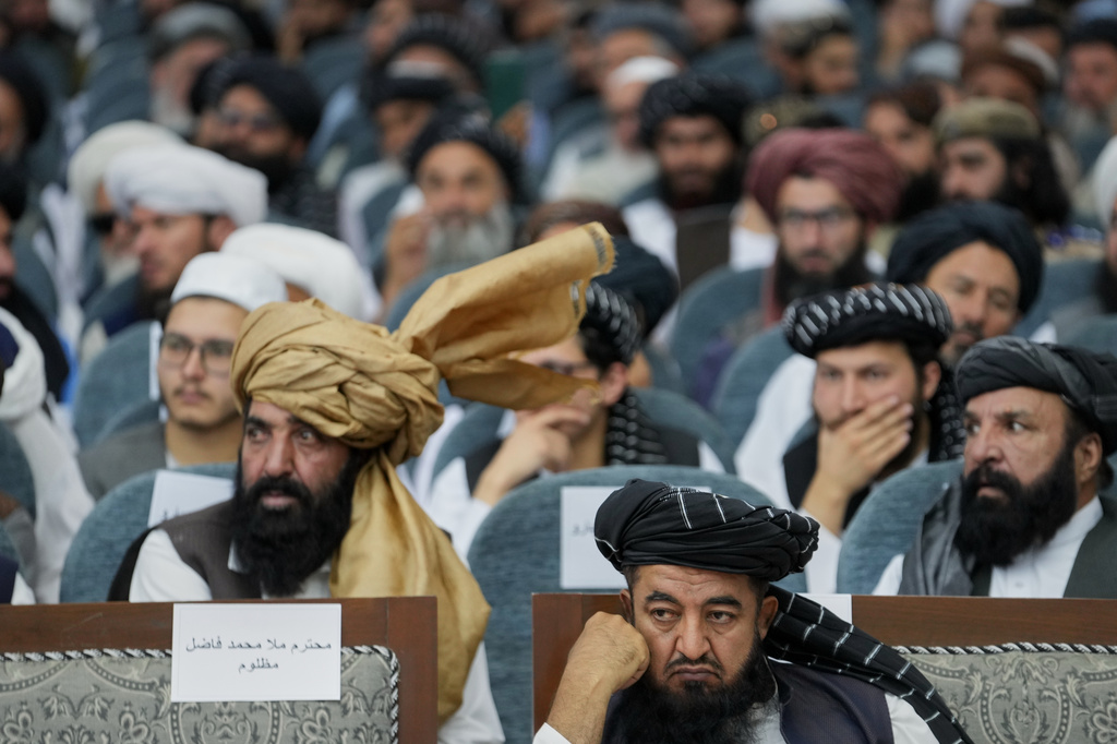 Taliban delegates from across the country attend a meeting that opens celebrations marking the fifth anniversary of the U.S. withdrawal and the start of Taliban rule, at the Loya Jirga Hall in Kabul, Afghanistan, Saturday, Aug. 15, 2026. (AP Photo/Siddiqullah Alizai)