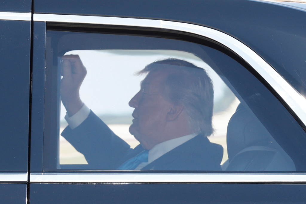 President Donald Trump is seen in his limousine known as, "The Beast," upon his arrival at Joint Base Andrews, Md., Wednesday, May 20, 2026. Trump attended the United States Coast Guard Academy commencement in New London, Conn., where he delivered the commencement address. (AP Photo/Luis M. Alvarez)