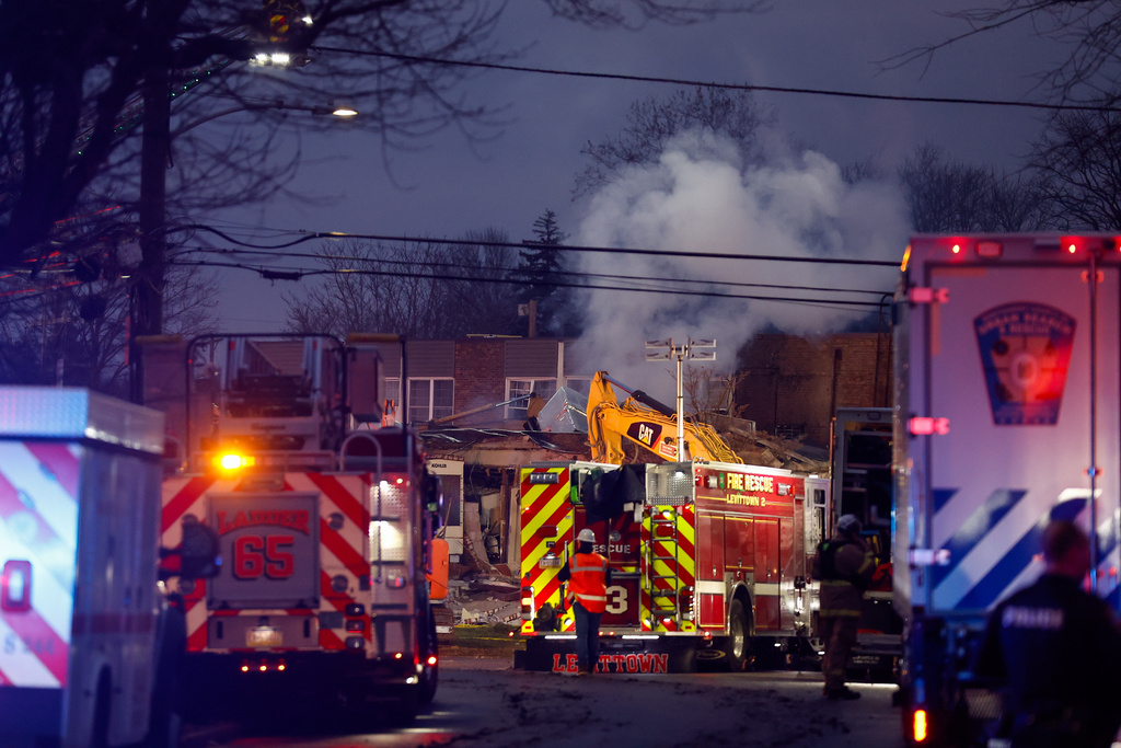 First responders work the scene of an explosion and fire at Bristol Health & Rehab Center, Tuesday, Dec. 23, 2025, in Bristol, Pa. (Monica Herndon/The Philadelphia Inquirer via AP)