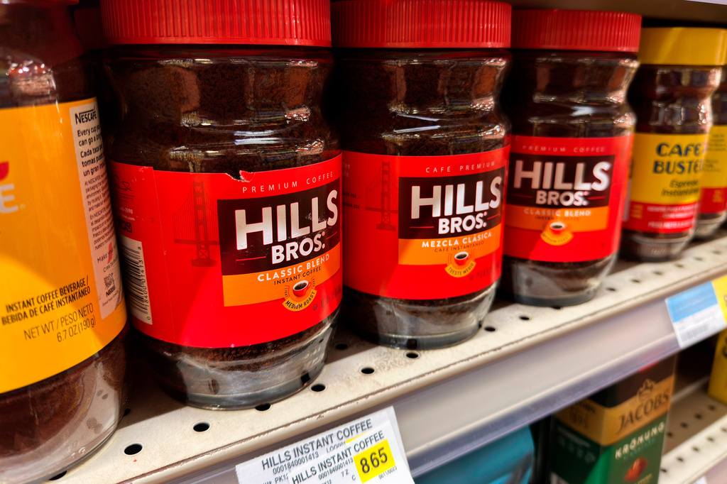 FILE - Coffee is displayed for sale at a grocery store Wednesday, April 29, 2026, in Chicago. (AP Photo/Erin Hooley, File)