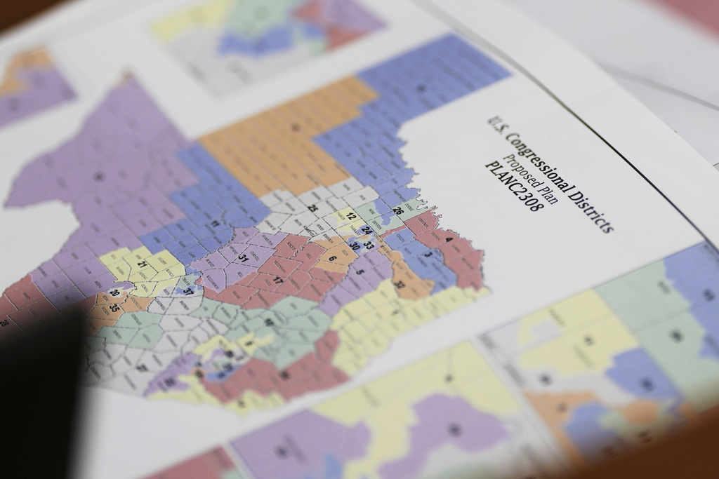 FILE - A map of U.S Congressional Districts proposed plan is seen at a Texas legislators' public hearing on congressional redistricting in Austin, Texas, Aug. 1, 2025. (AP Photo/Eric Gay, file)