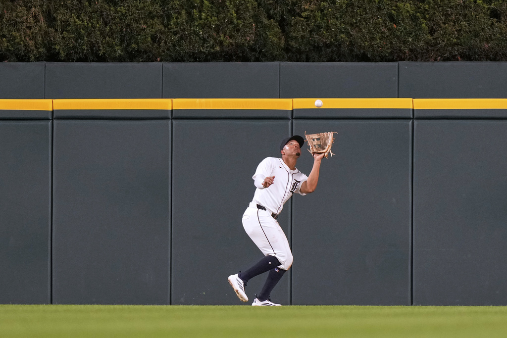 Detroit Tigers center fielder Wenceel Perez catches a fly out by Houston Astros' Jeremy Pena during the sixth inning of a baseball game, Tuesday, Aug. 19, 2025, in Detroit. (AP Photo/Ryan Sun)