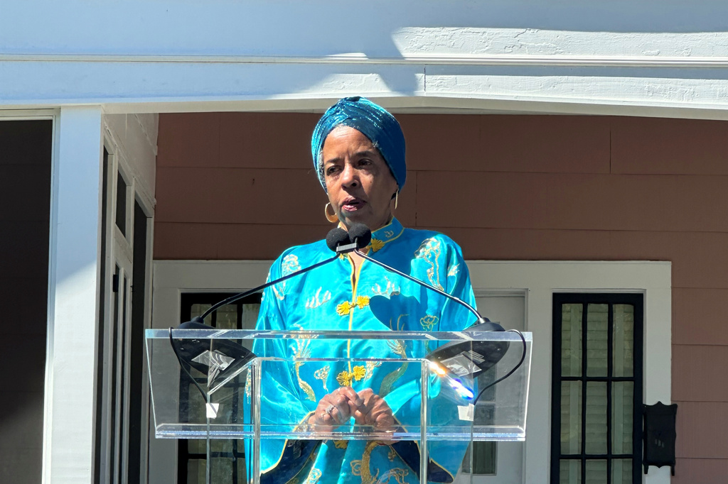 Jawana Jackson speaks at a ribbon cutting of her reconstructed family home on the grounds of The Henry Ford Museum Friday, June 12, 2026, in Dearborn, Mich. (AP Photo/Corey Williams)