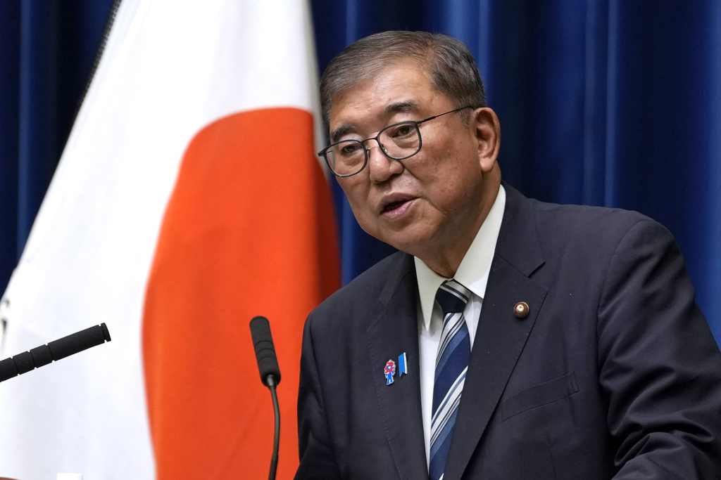 Japanese Prime Minister Shigeru Ishiba speaks during a news conference at the prime minister's office in Tokyo, Japan, Sunday, Sept. 7, 2025. (Toru Hanai/Pool Photo via AP)