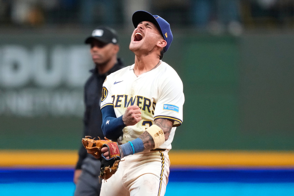 Milwaukee Brewers shortstop Joey Ortiz (3) reacts to the team's win over the Chicago Cubs in Game 5 of baseball's National League Division Series, Saturday, Oct. 11, 2025, in Milwaukee. (AP Photo/Kayla Wolf)