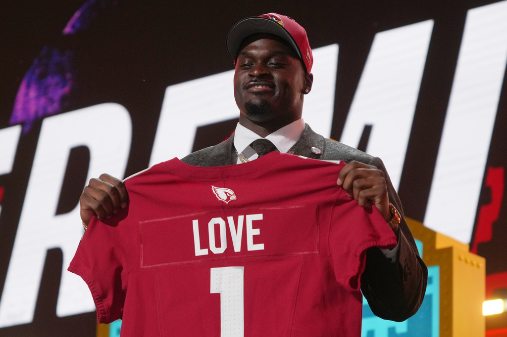 Notre Dame running back Jeremiyah Love poses after being chosen by the Arizona Cardinals with the third overall pick during the first round of the NFL football draft, Thursday, April 23, 2026, in Pittsburgh. (AP Photo/Gene J. Puskar)