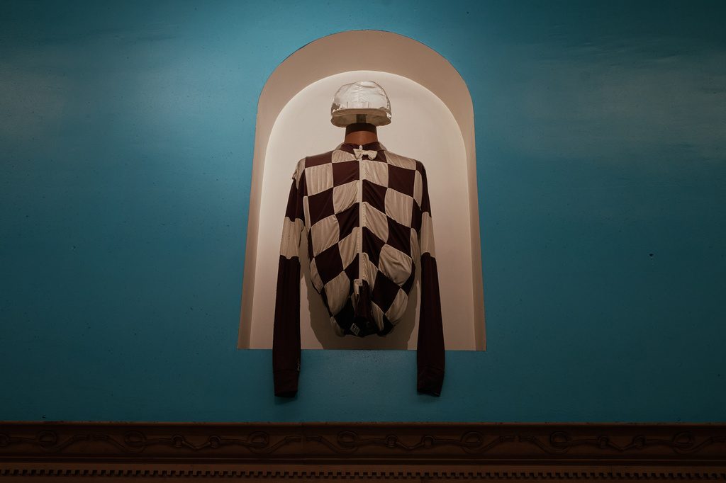A jockey's silks are on exhibit inside Aqueduct Racetrack in the Queens borough of New York, Saturday, June 27, 2026. (AP Photo/Andres Kudacki)