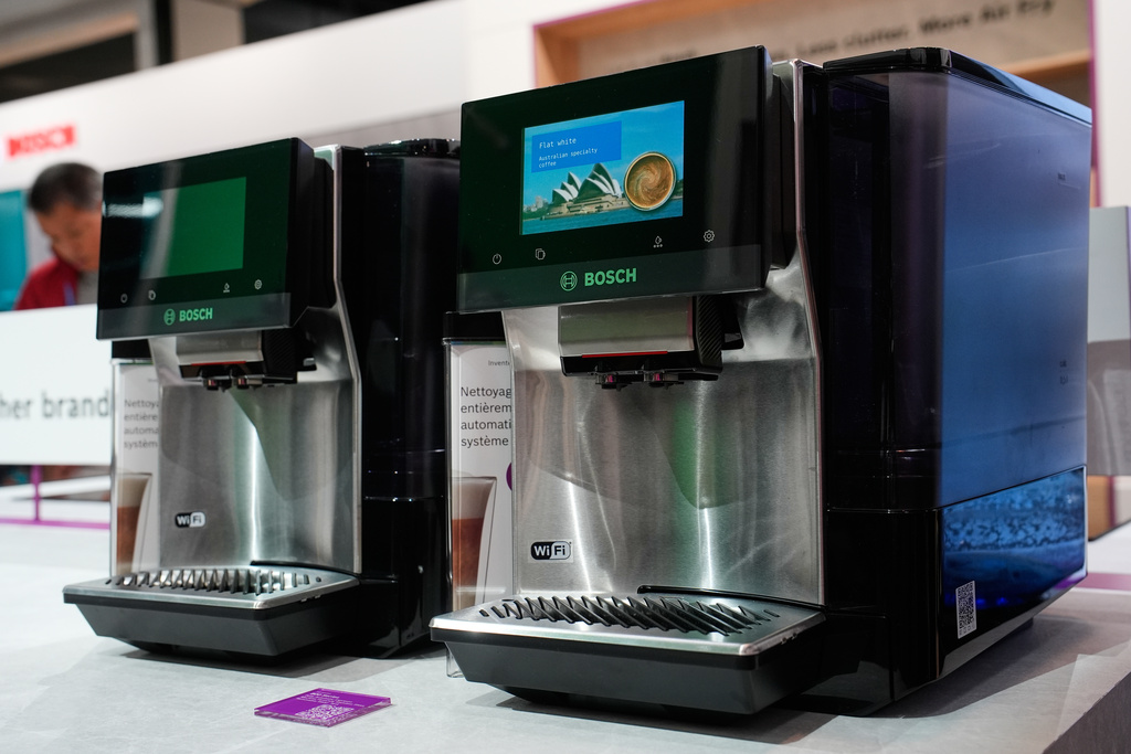 A couple of Bosch 800 Series fully automatic espresso machines are seen on display at the Bosch booth during the CES tech show Wednesday, Jan. 7, 2026, in Las Vegas. (AP Photo/John Locher)