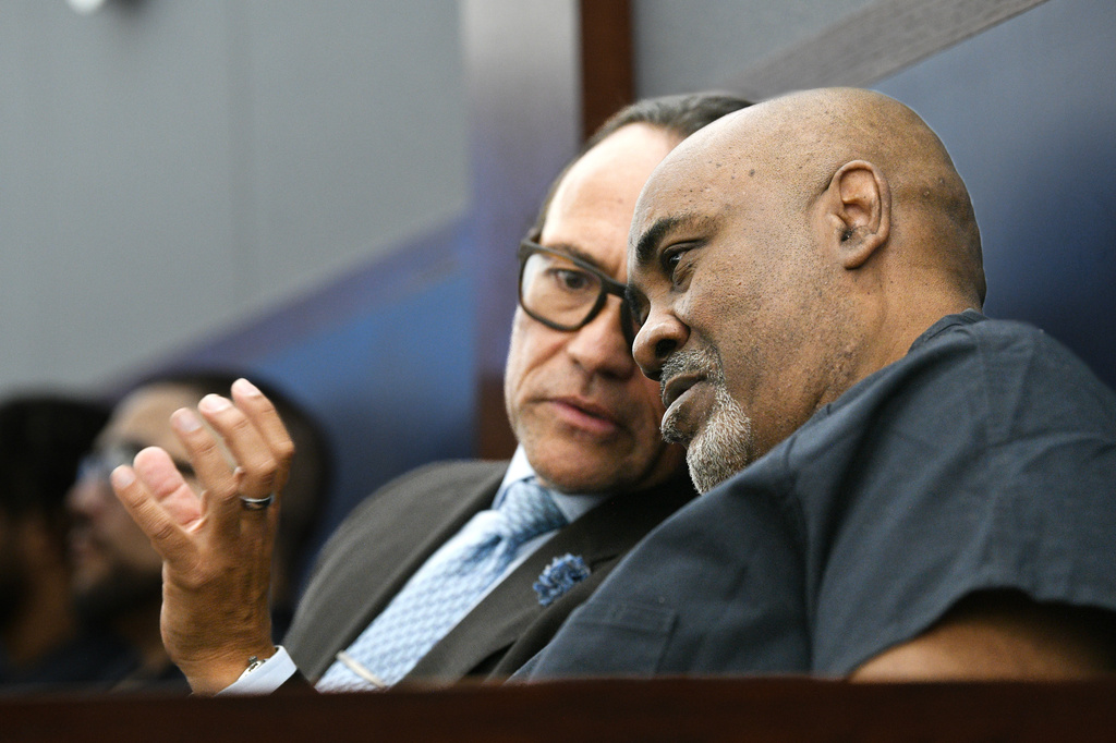 Duane Davis, right, talks with attorney Michael Sanft as he appears in district court for a pretrial hearing Tuesday, July 28, 2026, in Las Vegas. (Sam Morris/Las Vegas Review-Journal via AP, Pool)