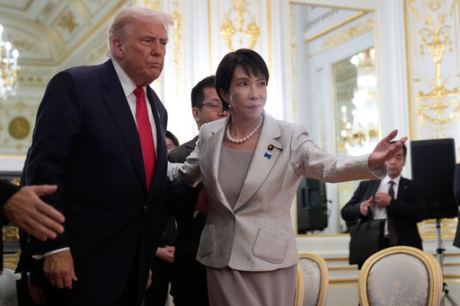 President Donald Trump, left, is escorted by Japan's Prime Minister Sanae Takaichi during a meeting with families of Japanese abductees by North Korea at Akasaka Palace in Tokyo, Japan, Tuesday, Oct. 28, 2025. (AP Photo/Mark Schiefelbein) President Donald Trump, left, is escorted by Japan's Prime Minister Sanae Takaichi during a meeting with families of Japanese abductees by North Korea at Akasaka Palace in Tokyo, Japan, Tuesday, Oct. 28, 2025. (AP Photo/Mark Schiefelbein)