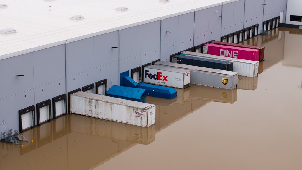 Businesses near State Route 167, between Auburn and Kent, Wash., experience flooding, Tuesday, Dec. 16, 2025. (Erika Schultz/The Seattle Times via AP)