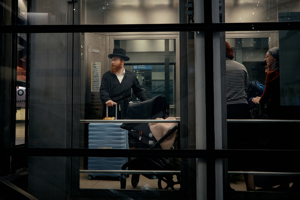 Passengers use the elevator at Newark Liberty International Airport on Friday, Nov. 7, 2025 in Newark, N.J. (AP Photo/Andres Kudacki)