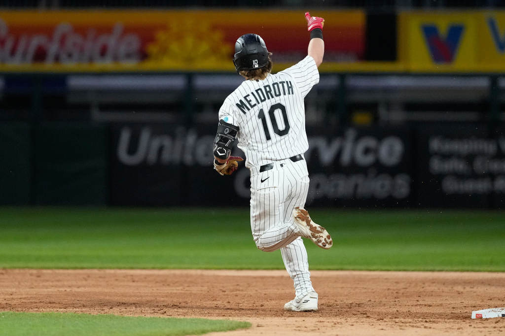 Chicago White Sox's Chase Meidroth celebrates as he rounds the bases after hitting a three-run home run during the fifth inning of a baseball game against the Kansas City Royals in Chicago, Tuesday, May 12, 2026. (AP Photo/Nam Y. Huh)