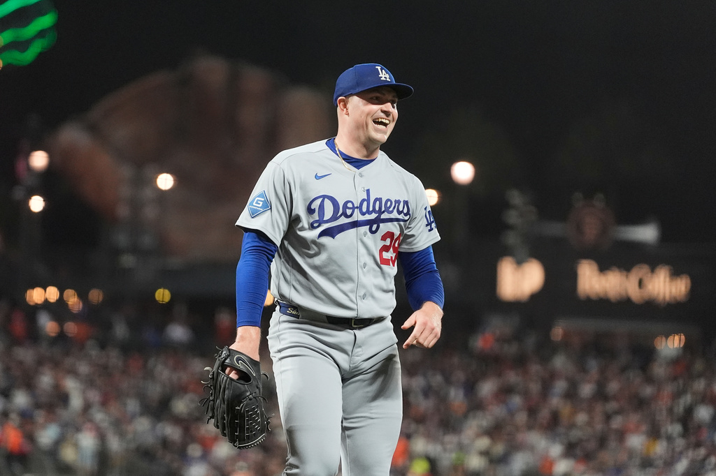 Los Angeles Dodgers pitcher Tarik Skubal (29) smiles as he walks to the dugout after San Francisco Giants' Shay Whitcomb struck out during the fifth inning of a baseball game, Friday, Sept. 25, 2026, in San Francisco. (AP Photo/Jeff Chiu)