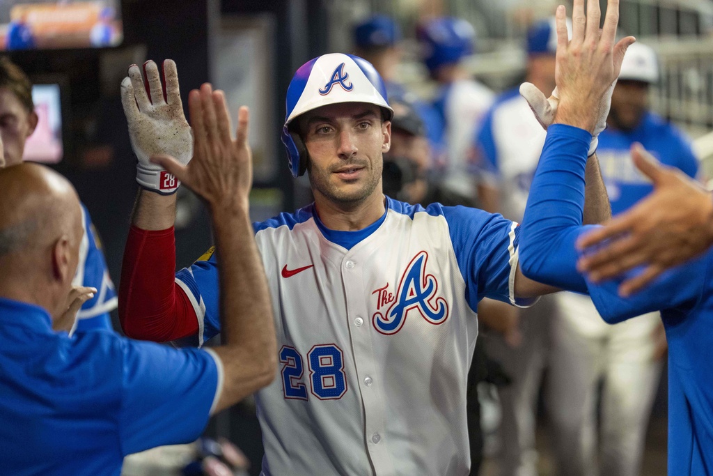 Atlanta Braves first base Matt Olson (28) celebrates after he makes a run during the fourth inning of a baseball game against the Seattle Mariners Saturday, Sept. 6, 2025, in Atlanta. (AP Photo/Erik Rank)