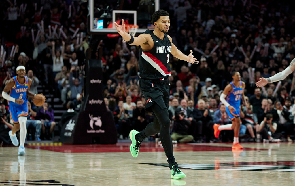 Portland Trail Blazers forward Toumani Camara reacts after scoring against the Oklahoma City Thunder during the second half of an NBA basketball game in Portland, Ore., Wednesday, Nov. 5, 2025. (AP Photo/Craig Mitchelldyer)