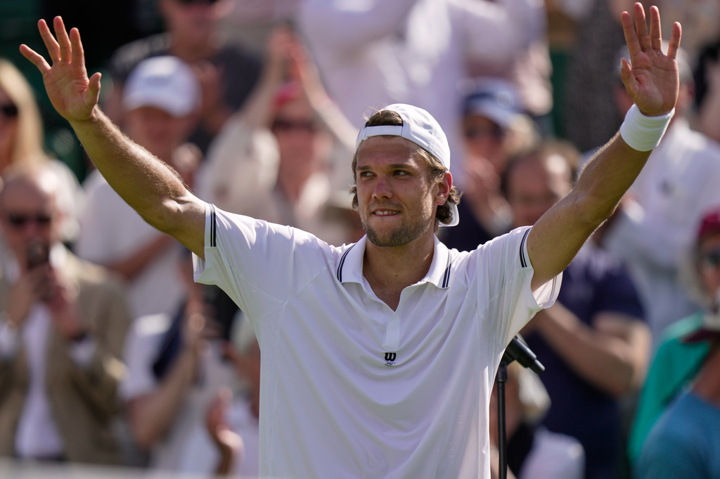 Otto Virtanen of Finland celebrates winning against Ben Shelton of the United States after their men's singles match at the Wimbledon Tennis Championships in London, Tuesday, June 30, 2026.(AP Photo/Brian Inganga)