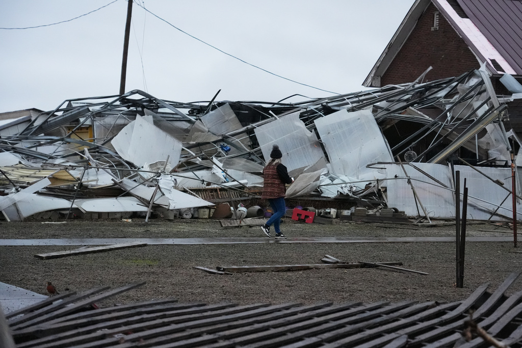 A storm-damaged Tholens' Landscape & Garden center is seen in the aftermath of a powerful storm that ripped through the area a day earlier in Kankakee, Ill., Wednesday, March 11, 2026. (AP Photo/Nam Y. Huh)
