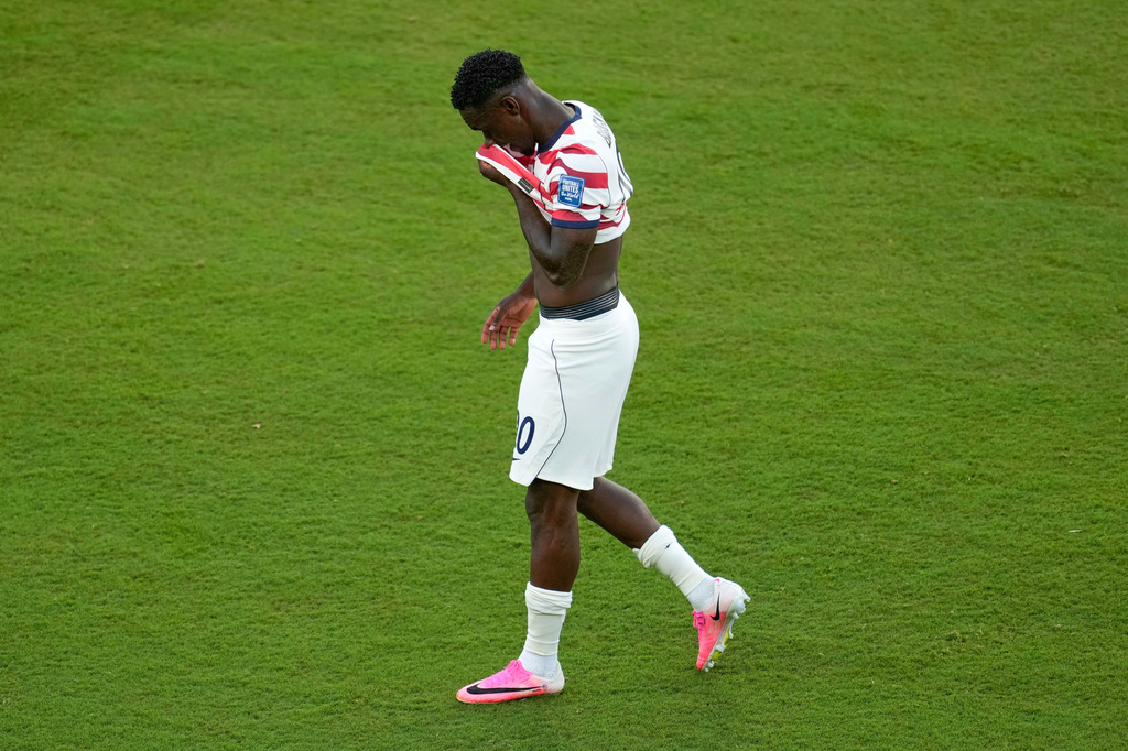 United States' Folarin Balogun (20) reacts to a red card during the World Cup round of 32 soccer match between the United States and Bosnia in Santa Clara, Calif., near San Francisco, Wednesday, July 1, 2026. (AP Photo/Jeff Chiu)