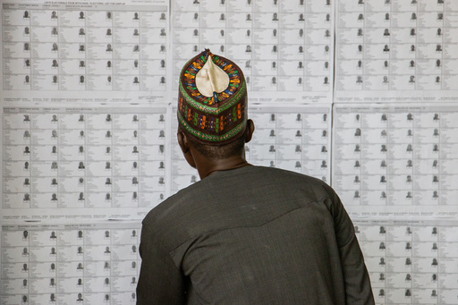 A voter checks his name on the voters' list before casting his ballot at a polling station in Garoua, Cameroon, Sunday, Oct. 12, 2025 (AP Photo/Welba Yamo Pascal) A voter checks his name on the voters' list before casting his ballot at a polling station in Garoua, Cameroon, Sunday, Oct. 12, 2025 (AP Photo/Welba Yamo Pascal)