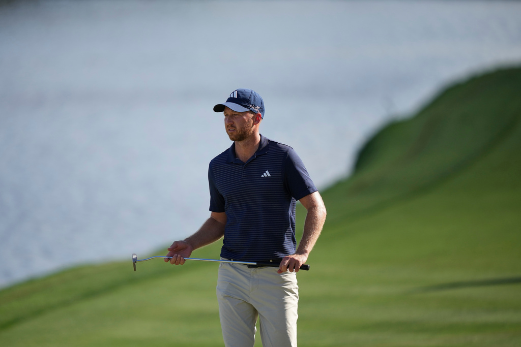 Daniel Berger walks up the 18th fairway during the second round of the Arnold Palmer Invitational at Bay Hill golf tournament Friday, March 6, 2026, in Orlando, Fla. (AP Photo/Matt Slocum)