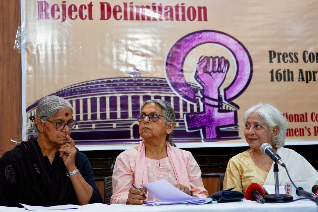 Communist Party of India member Annie Raja, left, activist Padma Singh, center, and writer Radha Kumar address a press conference after sending a petition on women's reservation to the parliamentarians in New Delhi, India, Thursday, April 16, 2026. (AP Photo/Manish Swarup)