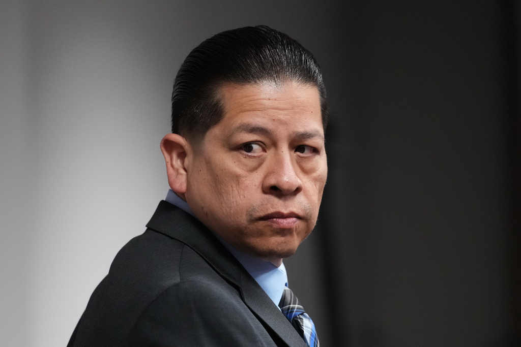 Former Uvalde school district police officer Adrian Gonzales arrives in the courtroom at the Nueces County Courthouse in Corpus Christi, Texas, Tuesday, Jan. 6, 2026. (AP Photo/Eric Gay, Pool)