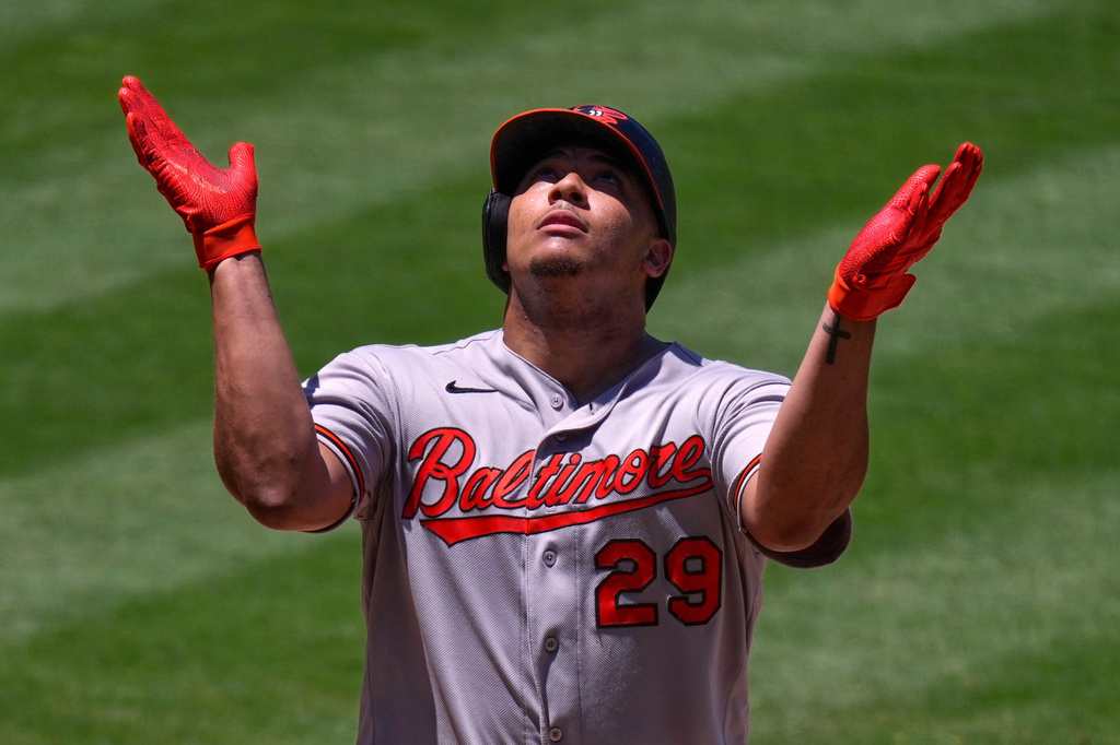 Baltimore Orioles' Samuel Basallo, gestures as he scores after hitting a two-run home run during the third inning of a baseball game against the Los Angeles Angels, Wednesday, June 24, 2026, in Anaheim, Calif. (AP Photo/Mark J. Terrill)