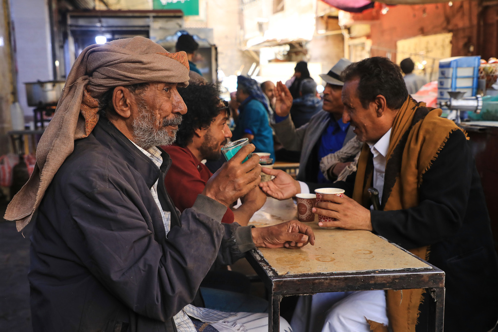 People chat at a coffee shop in Sanaa, Yemen, Monday, Sept. 14, 2026. (AP Photo/Osamah Abdulrahman)