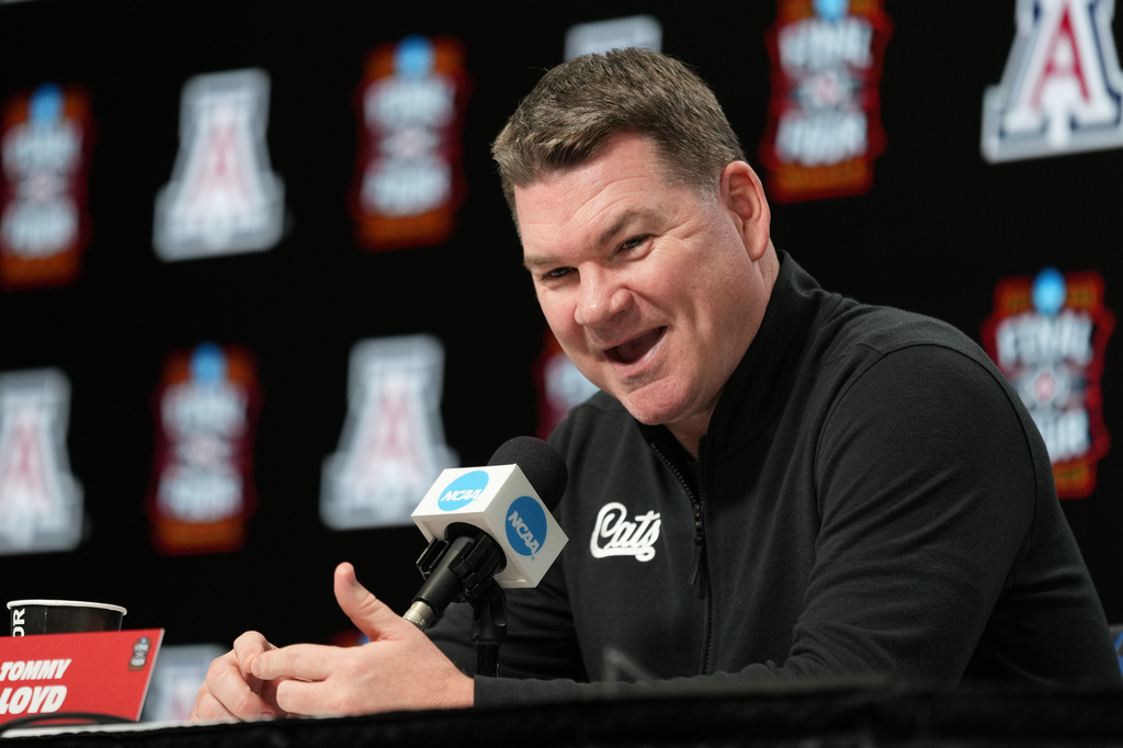 Arizona head coach Tommy Lloyd speaks during a news conference ahead of a national semifinal NCAA college basketball tournament game against Michigan at the Final Four, Thursday, April 2, 2026, in Indianapolis. (AP Photo/Abbie Parr)