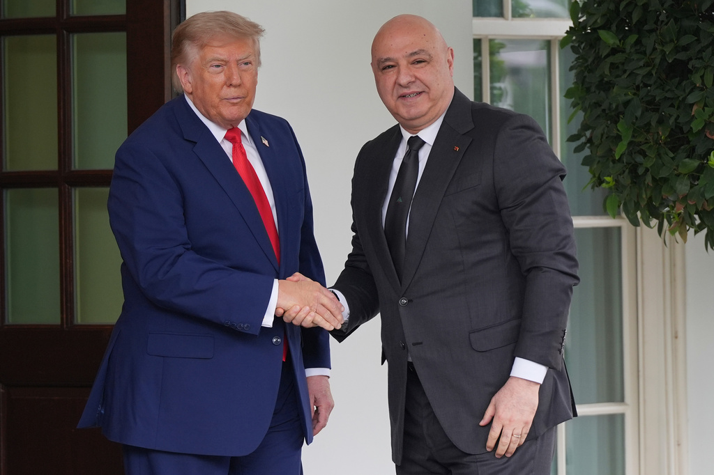 President Donald Trump greets Lebanon's President Joseph Aoun on his arrival at the White House, Tuesday, July 21, 2026, in Washington. (AP Photo/Julia Demaree Nikhinson)