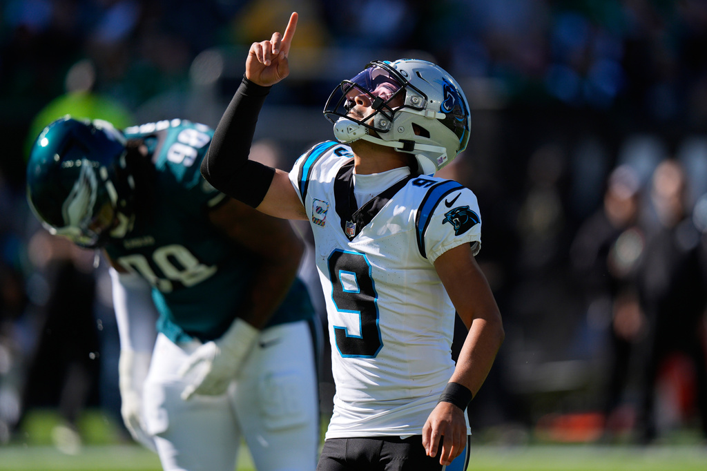 Carolina Panthers quarterback Bryce Young reacts to his touchdown pass to Panthers tight end Tommy Tremble during the first half of an NFL football game against the Philadelphia Eagles in Philadelphia, Sunday, Oct. 18, 2026. (AP Photo/Chris Szagola)
