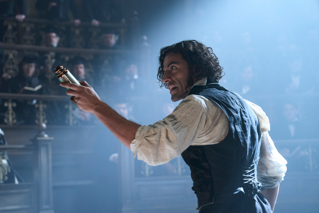 This image released by Netflix shows Oscar Isaac as Victor Frankenstein in a scene from "Frankenstein." (Ken Woroner/Netflix via AP)