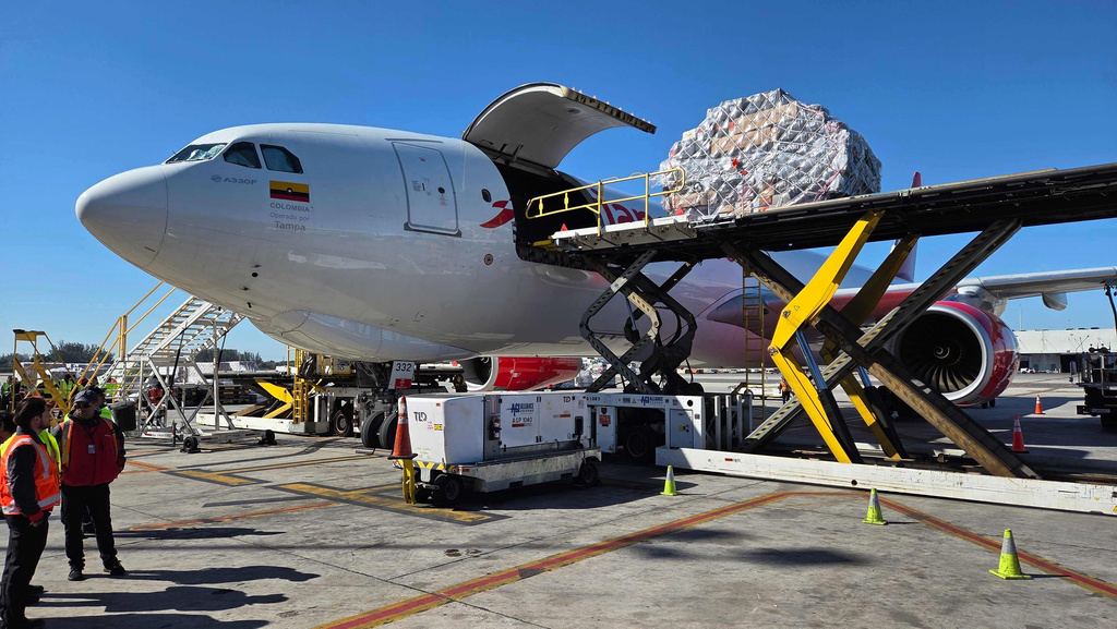 Boxes of Valentine's Day flowers arrive from Colombia at Miami International Airport, on Friday, Feb. 6, 2026, in Miami. (AP Photo/David Fischer)