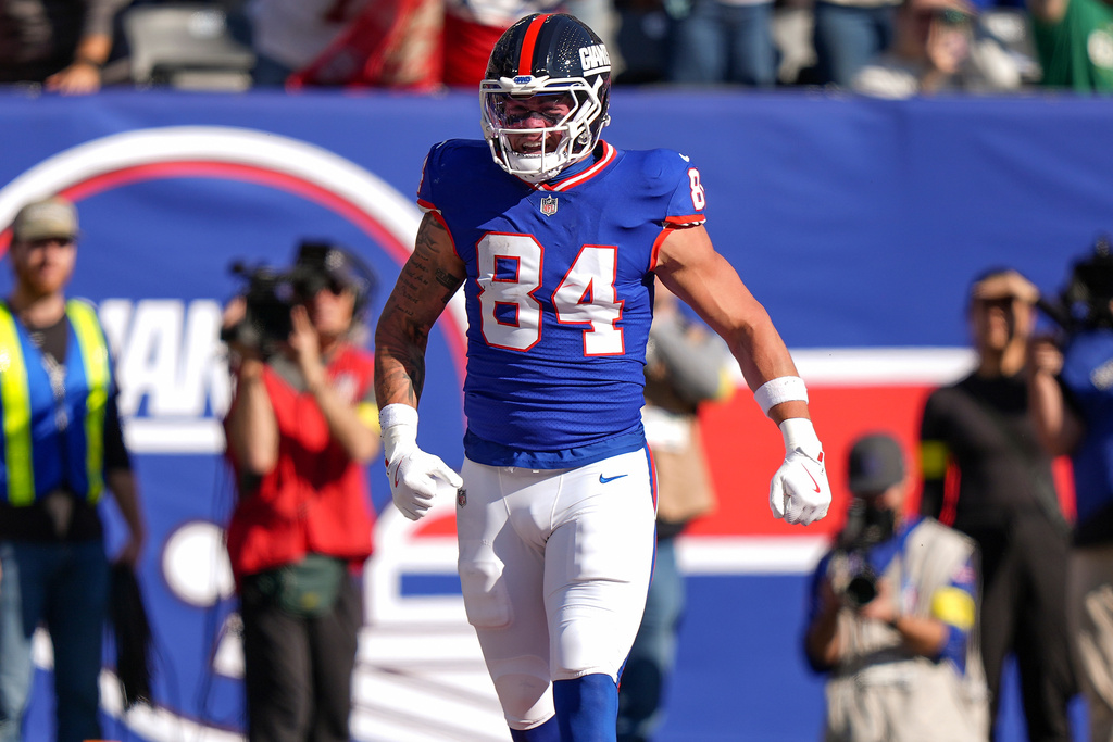 New York Giants tight end Theo Johnson (84) reacts after scoring a touchdown against the San Francisco 49ers during the first quarter of an NFL football game, Sunday, Nov. 2, 2025, in East Rutherford, N.J. (AP Photo/Frank Franklin II)