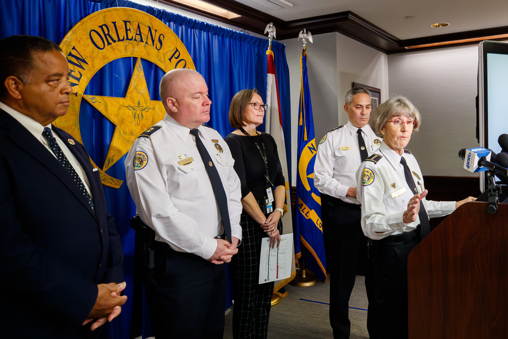 New Orleans Police Department superintendent Anne Kirkpatrick, with members of police command staff and New Orleans City Councilmember Eugene Green, far left, speaks about the city's crime statistics during a news conference at police headquarters in New Orleans, Monday, Jan. 5, 2026. (David Grunfeld/The Times-Picayune/The New Orleans Advocate via AP)