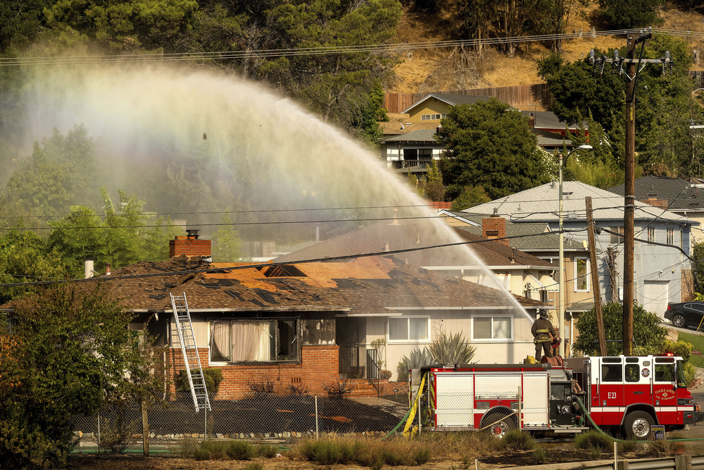 A fastmoving brush fire in California burned 2 homes while others were