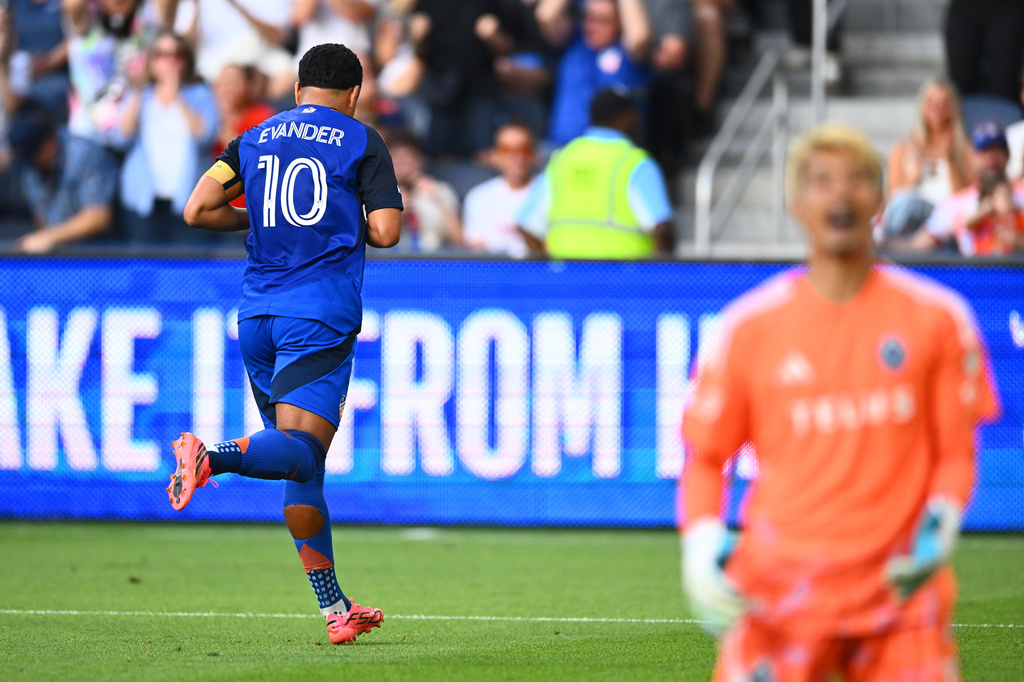 FC Cincinnati midfielder Evander (10) reacts after scoring a goal during the first half of an MLS soccer match against Vancouver Whitecaps FC in Cincinnati, Wednesday, July 22, 2026. (AP Photo/Ben Jackson)