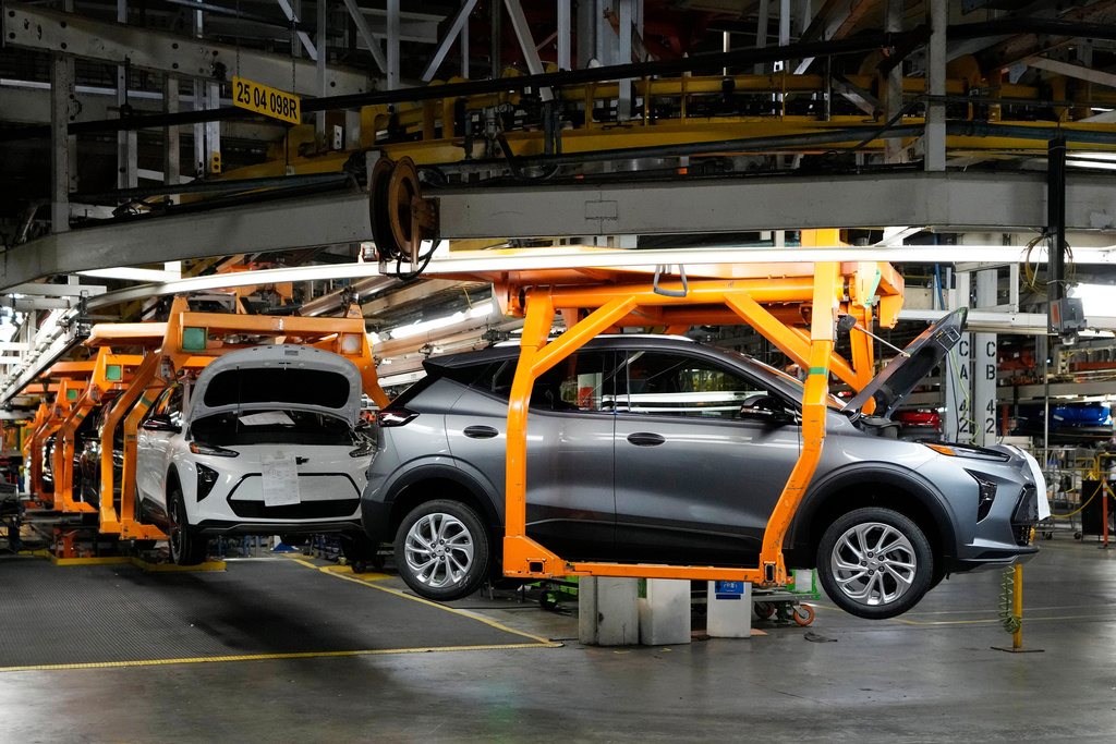 FILE - Vehicles move along the 2023 Chevrolet Bolt EV and EUV assembly line at the General Motors Orion Assembly June 15, 2023, in Lake Orion, Mich. (AP Photo/Carlos Osorio, File)