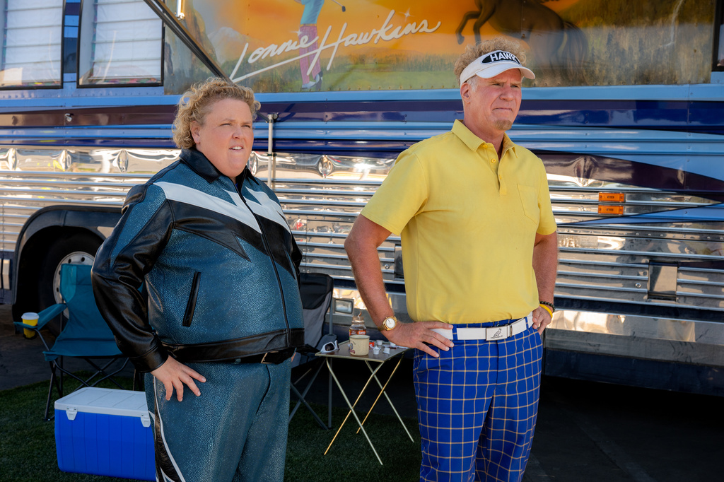 This image released by Netflix shows Fortune Feimster, left, and Will Ferrell in a scene from "The Hawk." (Colleen E Hayes/Netflix via AP)