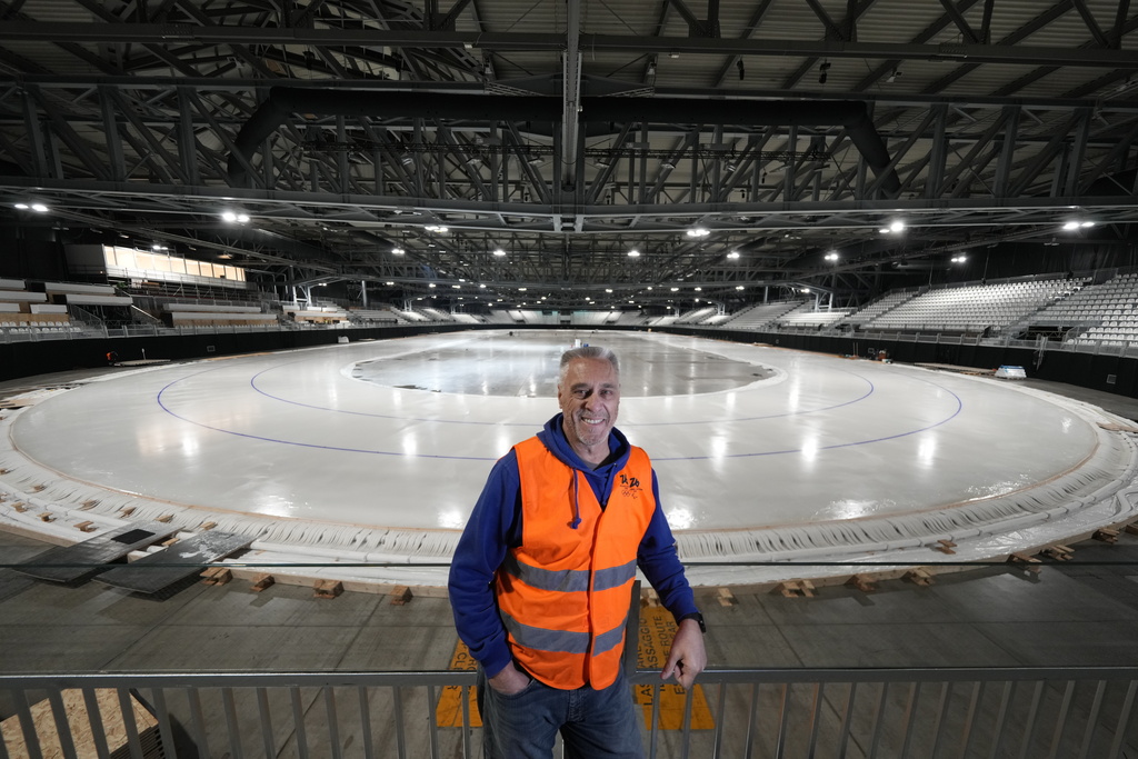 Ice Master Mark Messer poses in the stadium where speed skating discipline of the Milan Cortina 2026 Winter Olympics will take place, in Rho, outskirt of Milan, Tuesday, Nov. 11, 2025. (AP Photo/Luca Bruno)