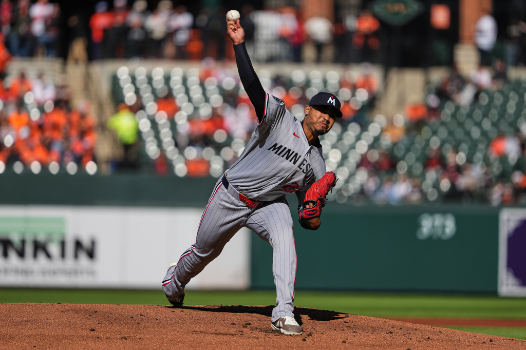 Minnesota Twins pitcher Taj Bradley delivers during the first inning of a baseball game against the Baltimore Orioles, Saturday, March 28, 2026, in Baltimore. (AP Photo/Stephanie Scarbrough)