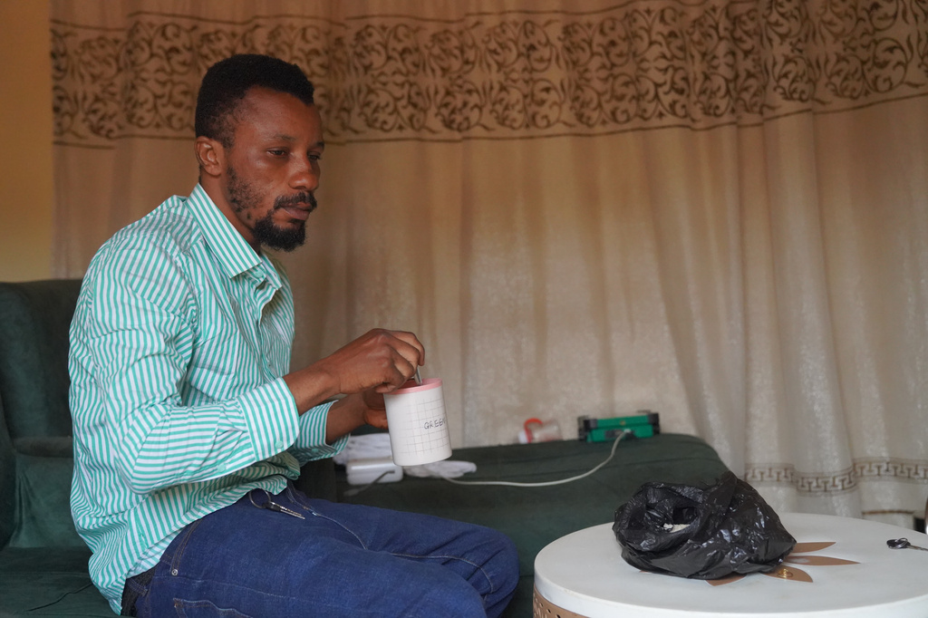 Wiza Bondele, a health worker on the prevention and control team, seen at his home in Ituri province, eastern Congo, Wednesday, Aug 5, 2026. (AP Photo/Dieudonne Dirole)