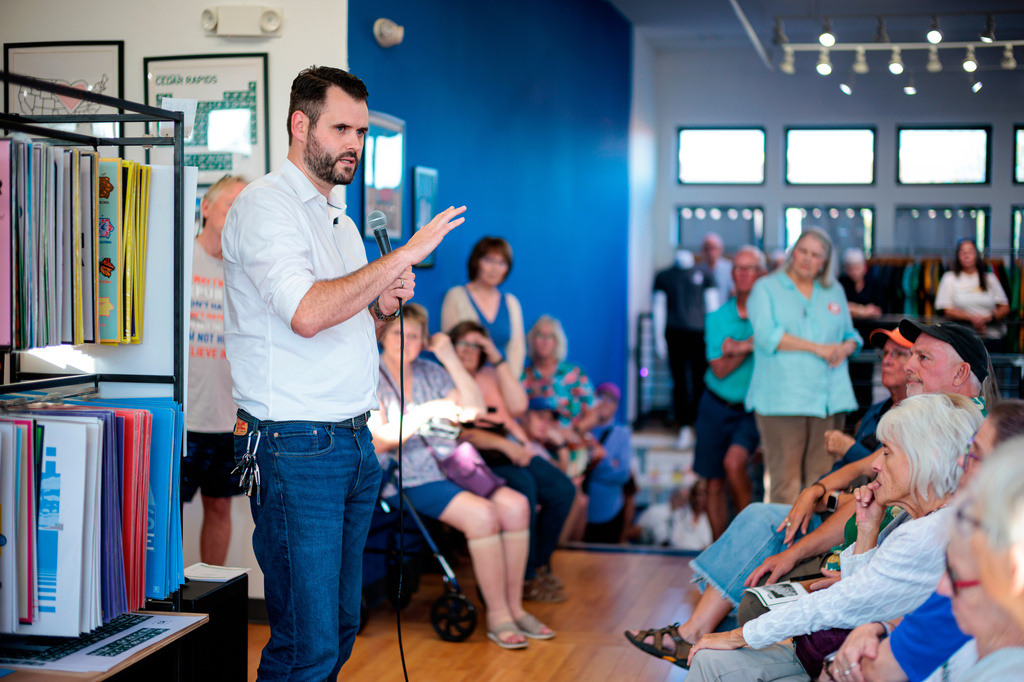 FILE - Iowa State Sen. and candidate for the Democratic nomination for U.S. Senate Zach Wahls speaks during a campaign event at RAYGUN Shirts store in Cedar Rapids, Iowa, Sept, 11, 2025. (Nick Rohlman/The Gazette via AP, File)